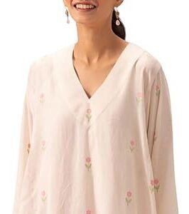 Woman wearing a light pink floral embroidered kurta with pink palazzo pants and flat sandals against a plain background.